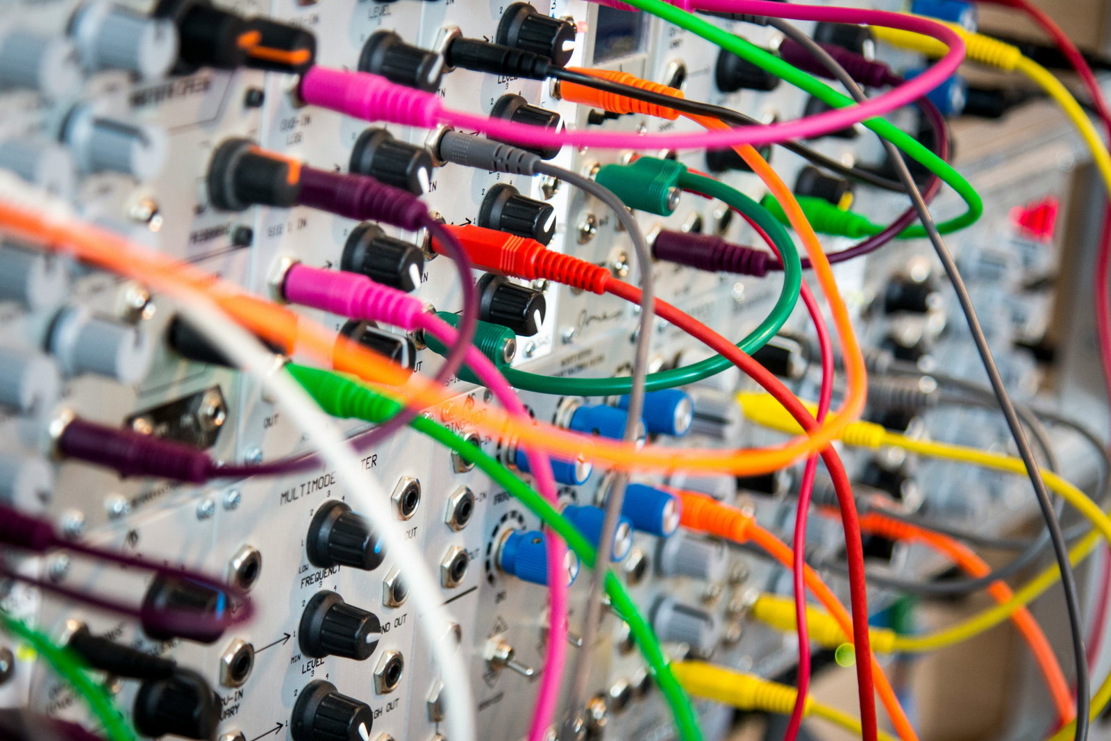 Close-up of a fiber-coupled photonic module under test
