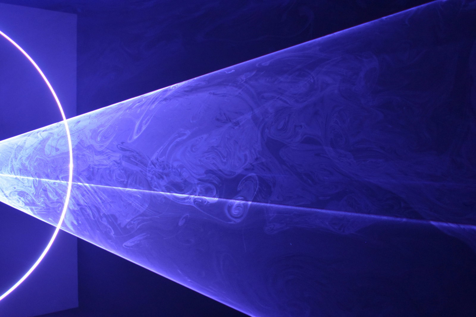 Laser beam path across an optical isolation table